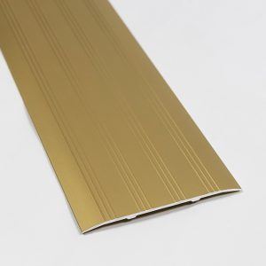 guldanodiserad tröskelplåt