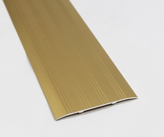 guldanodiserad tröskelplåt