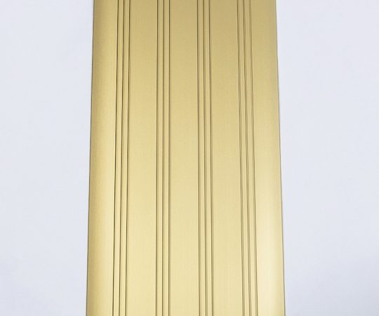 guldanodiserad tröskelplåt